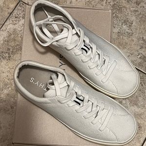 Rothys bright white lace up sneakers lightly worn.